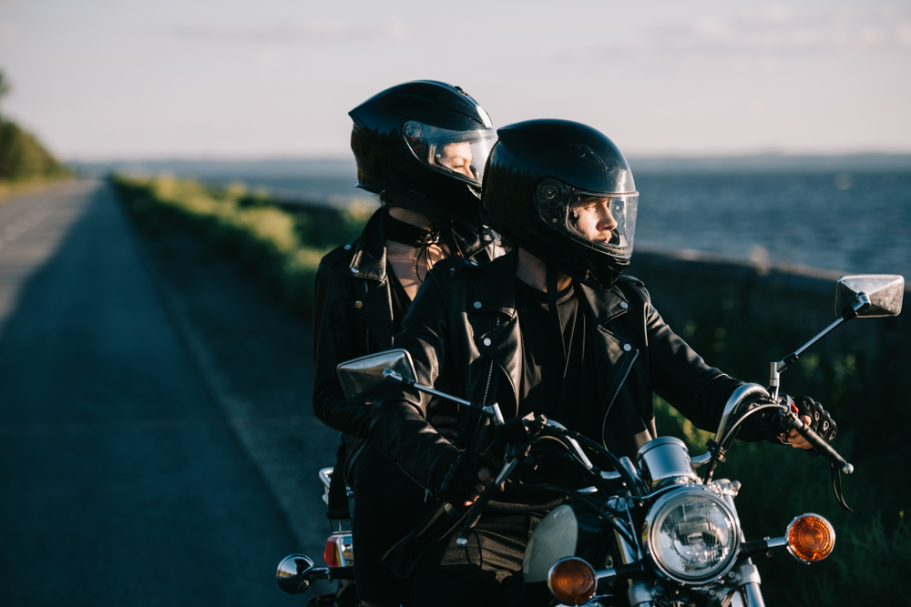 Couple,Of,Bikers,In,Helmets,Riding,Classical,Motorcycle,On,Country