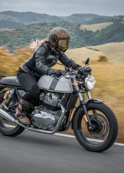 Woman,Riding,On,Classic,Motorcycle